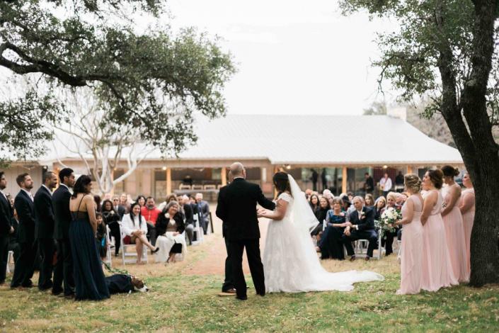 These newlyweds shared a beautiful outdoor wedding ceremony at The Moss Ranch at Enchanted Rock! 