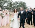 Bride and groom exit walk with fun streamers! 